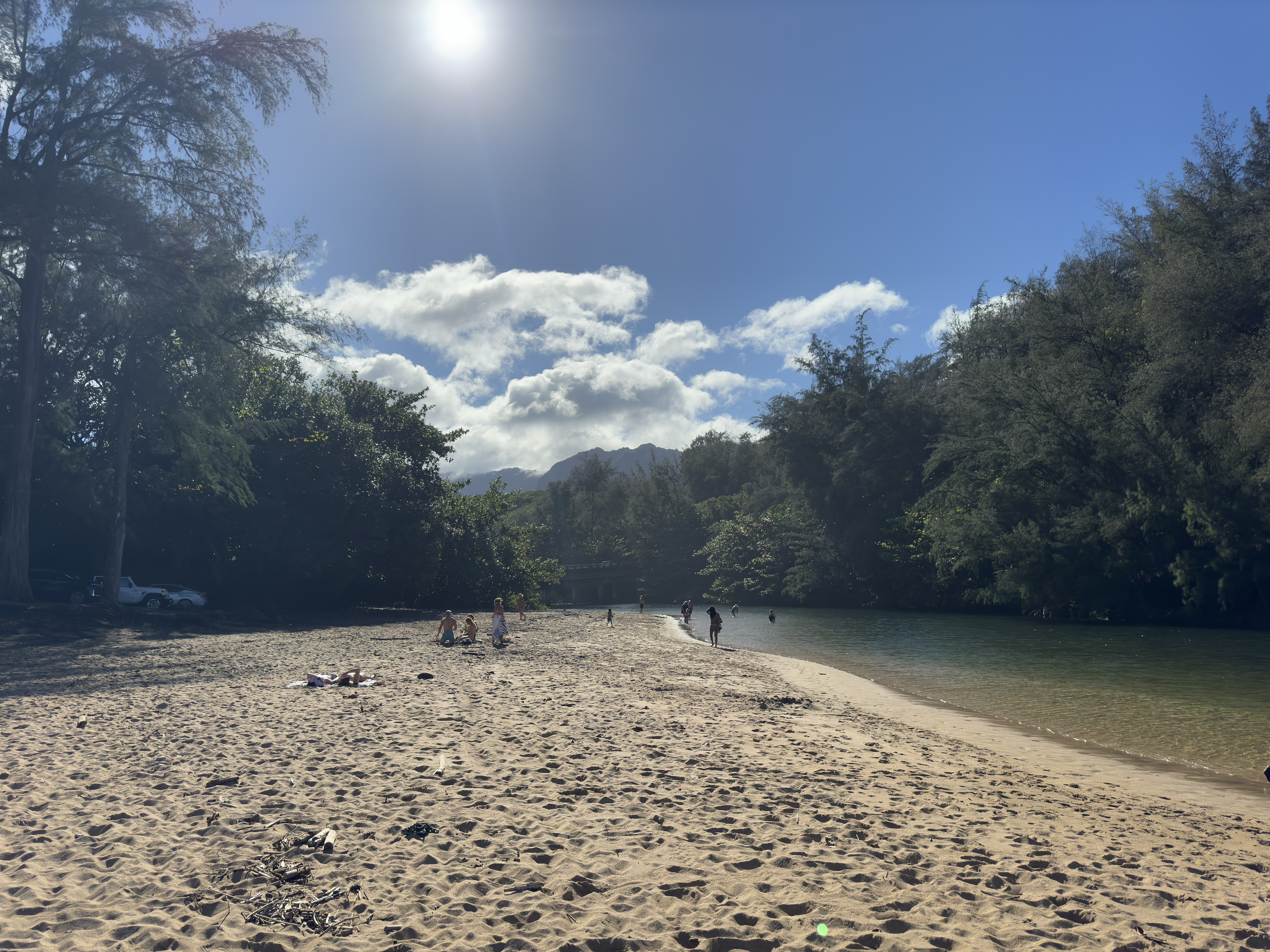 Calm waves and golden sands at Lumahai Beach.